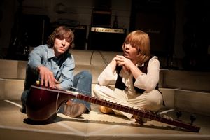 George (Andrew Yearick) introduces Brian (Aaron Snook) to the sitar Photo